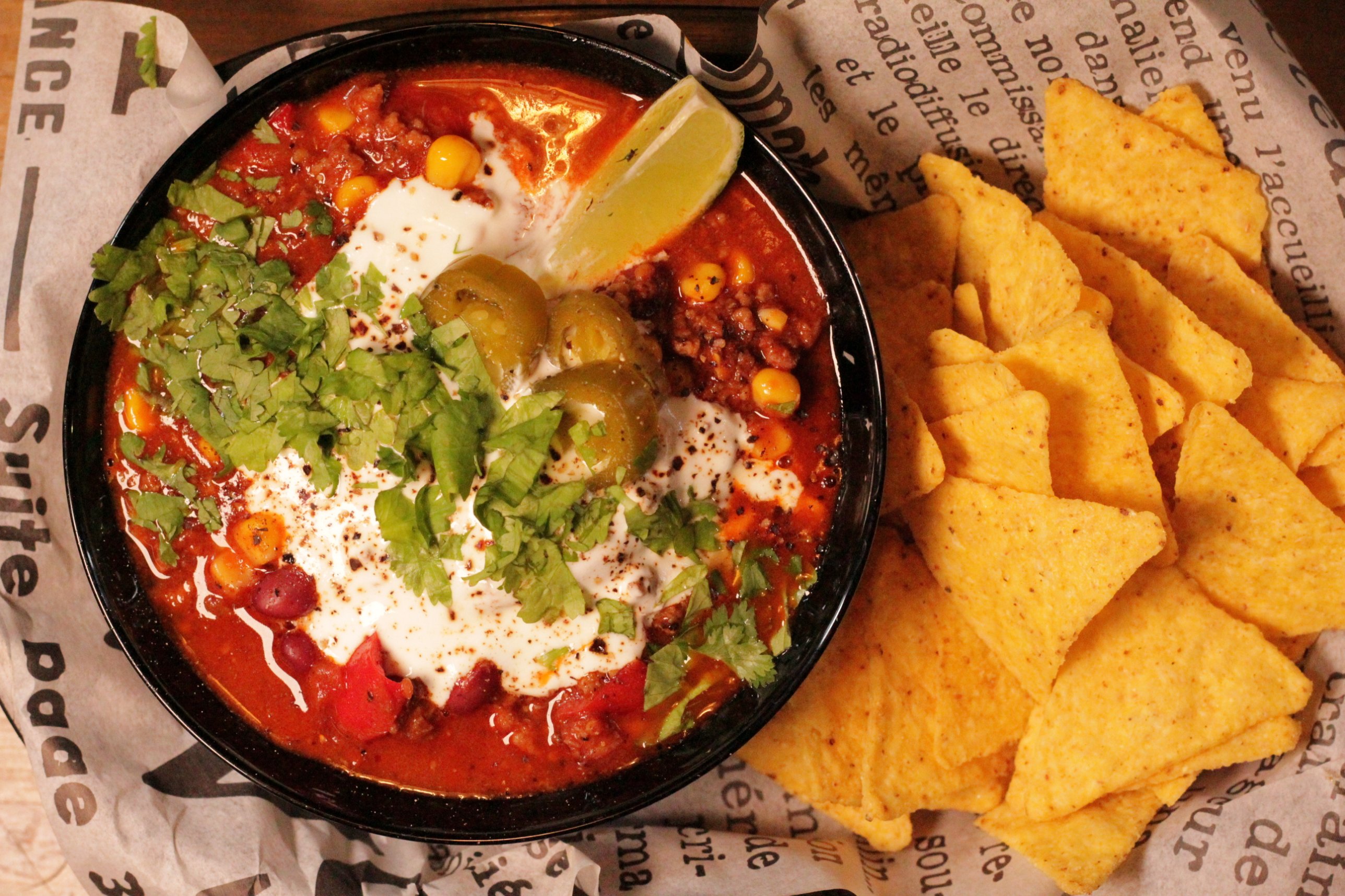 Chilli con carne with jalapeños close-up